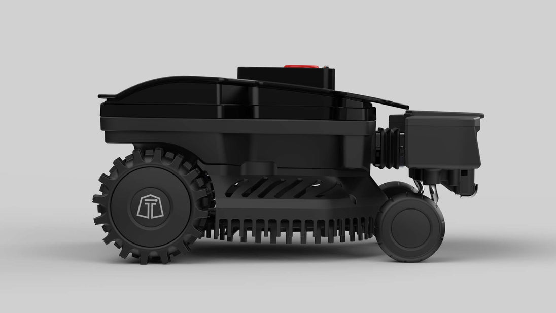 Das Bild zeigt den schwarzen Mähroboter Techline ZR von der Seite. Die Aufnahme ermöglicht eine klare Sicht auf die Reifen und das Gitter des Geräts. Die detaillierte Darstellung unterstreicht die robuste Bauweise und die praktischen Funktionen des Mähroboters.
