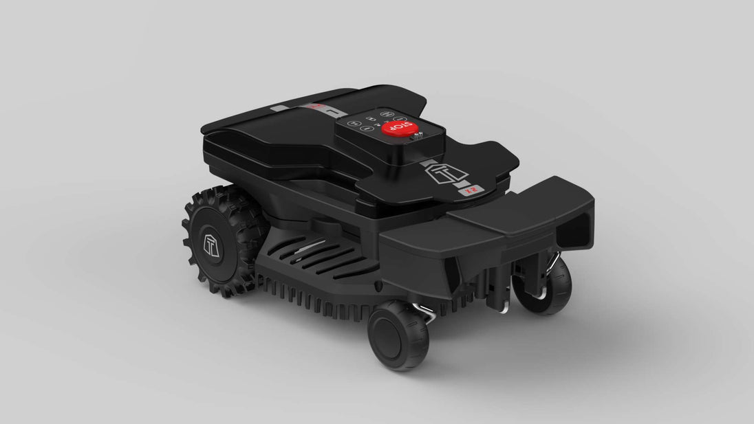 Das Bild zeigt den schwarzen Mähroboter Techline ZR in einer seitlichen Ansicht. Der grau-weiße Hintergrund sorgt für eine klare und fokussierte Darstellung des Geräts. Die Aufnahme ermöglicht eine detaillierte Betrachtung der Form und der technischen Merkmale des Mähroboters.